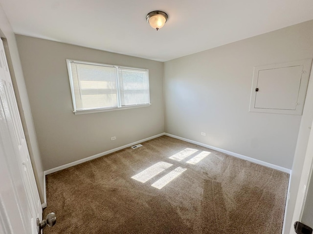 unfurnished room featuring carpet flooring