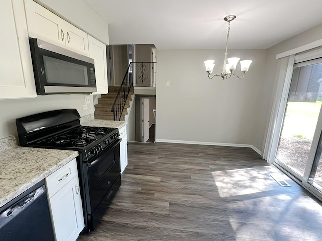 kitchen with a notable chandelier, black appliances, dark hardwood / wood-style floors, decorative light fixtures, and white cabinetry