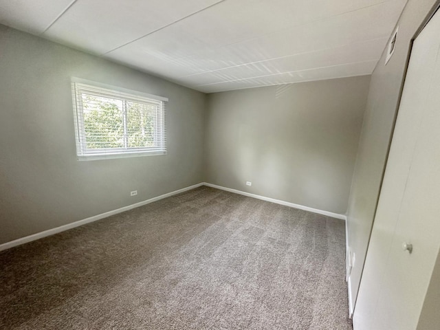 unfurnished room with carpet