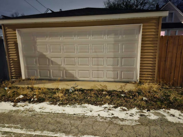 view of snow covered garage