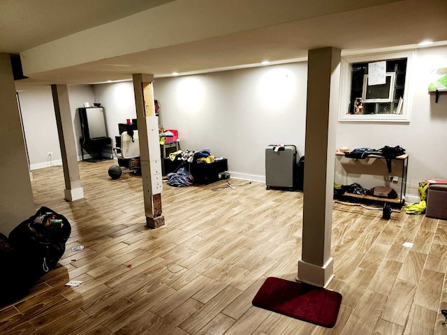 workout room with light wood-type flooring