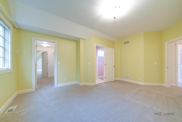 view of carpeted spare room