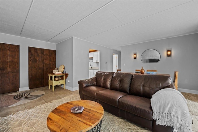 living room featuring light tile patterned floors