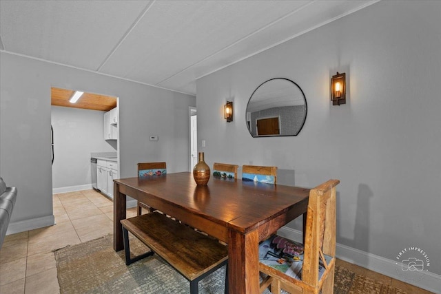 dining area with light tile patterned flooring