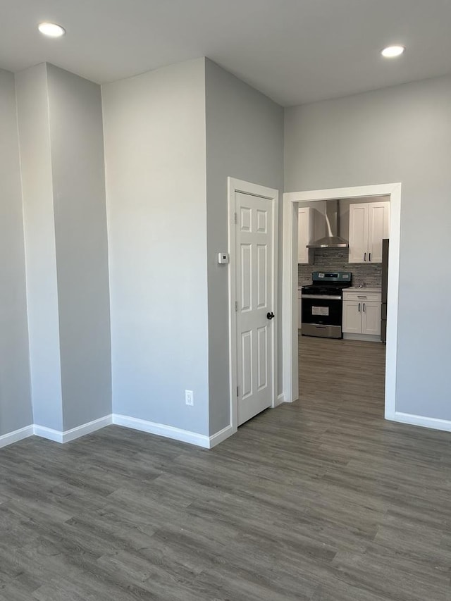 interior space with dark hardwood / wood-style floors