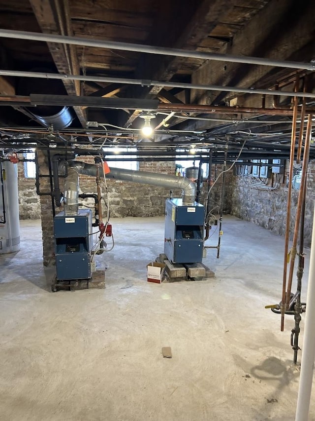 basement featuring gas water heater