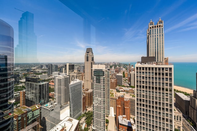 property's view of city featuring a water view