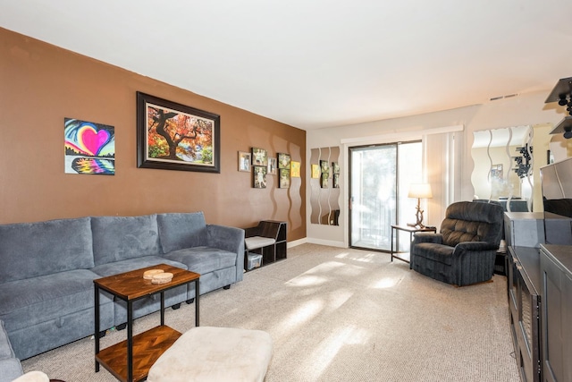 living room featuring light carpet