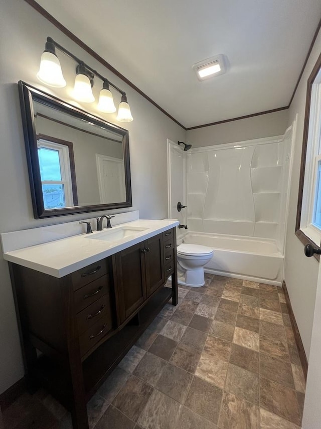 full bathroom with crown molding, vanity, toilet, and tub / shower combination