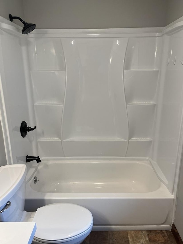 bathroom with shower / tub combination and toilet