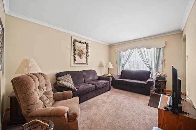 living room with ornamental molding and carpet flooring