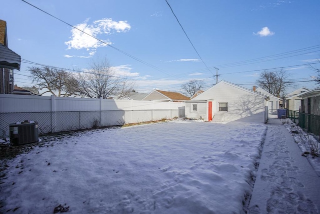 snowy yard with cooling unit