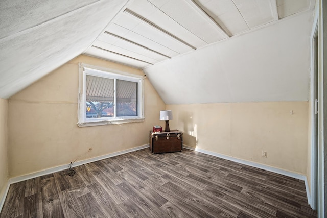 bonus room featuring lofted ceiling and wood-type flooring