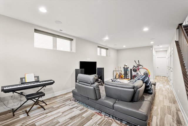 living room with light hardwood / wood-style flooring