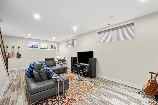 living room with light hardwood / wood-style floors