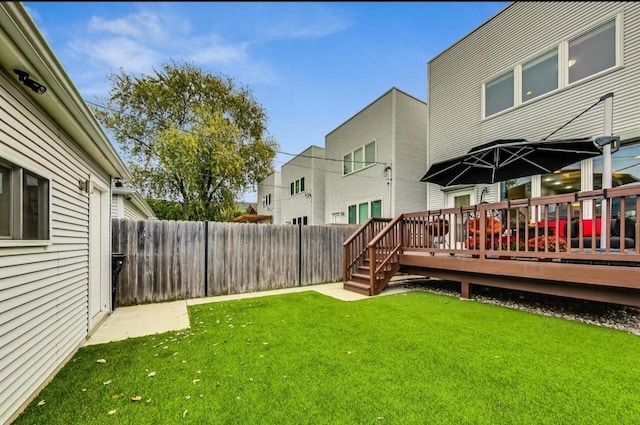 view of yard featuring a deck