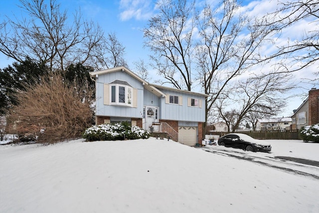 bi-level home featuring a garage