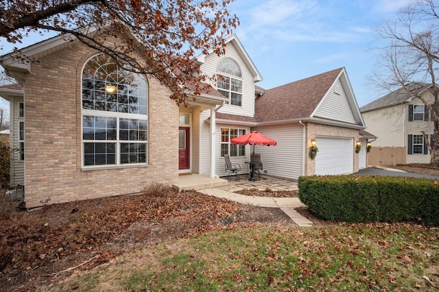 front of property with a garage