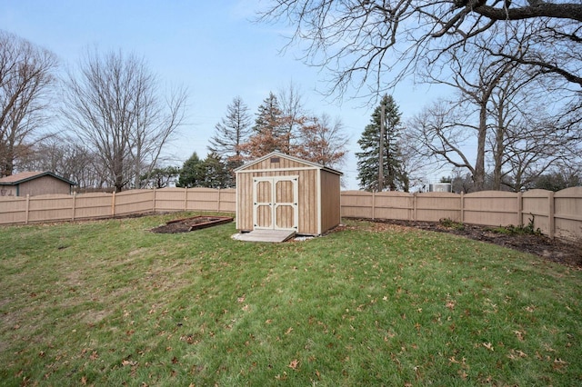 view of yard with a storage unit