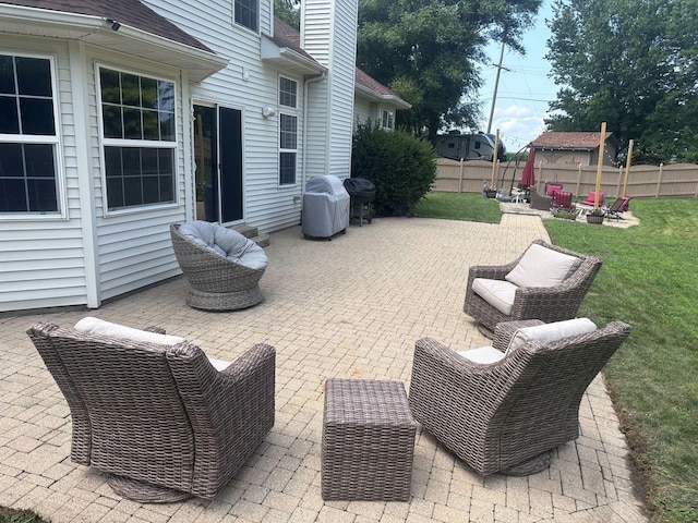 view of patio featuring a grill