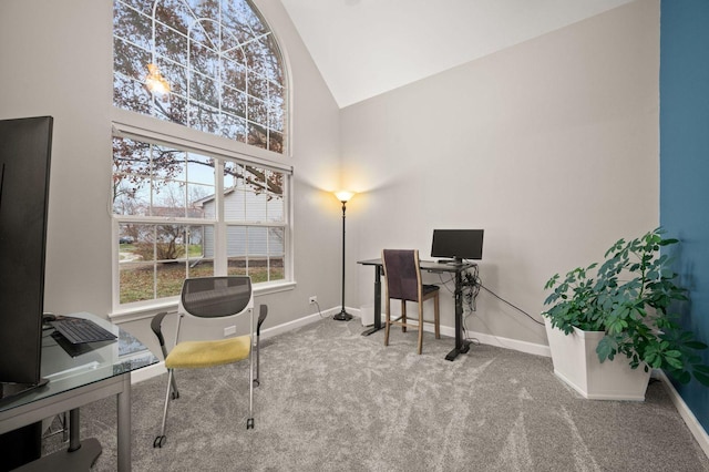 office area with carpet flooring and high vaulted ceiling