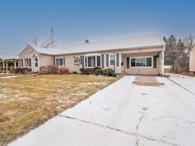 ranch-style house with a front yard