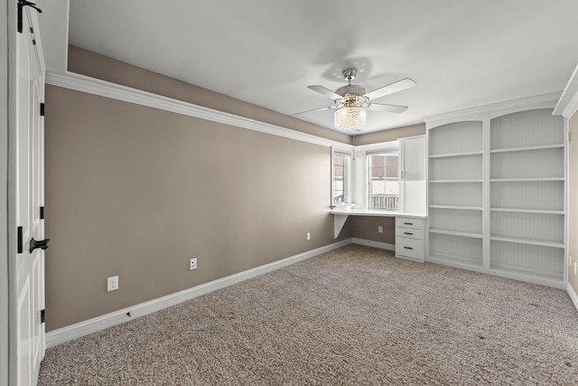 interior space featuring ceiling fan and carpet