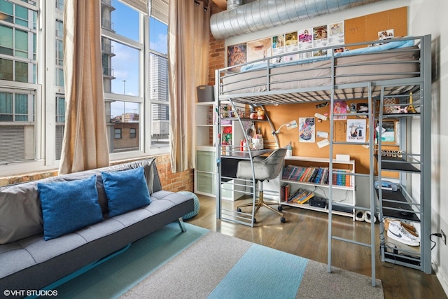 bedroom featuring hardwood / wood-style floors