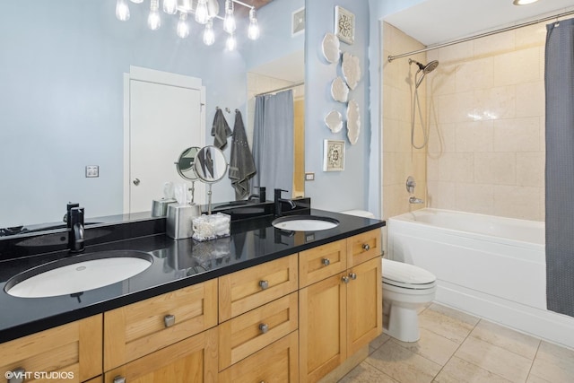 full bathroom featuring tile patterned flooring, toilet, vanity, and shower / bath combo