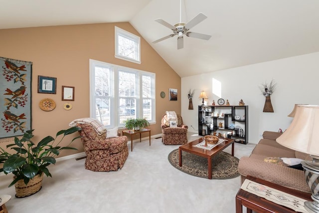 living room with ceiling fan, high vaulted ceiling, and carpet