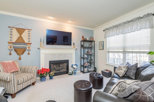 living room with a tile fireplace, crown molding, and carpet flooring