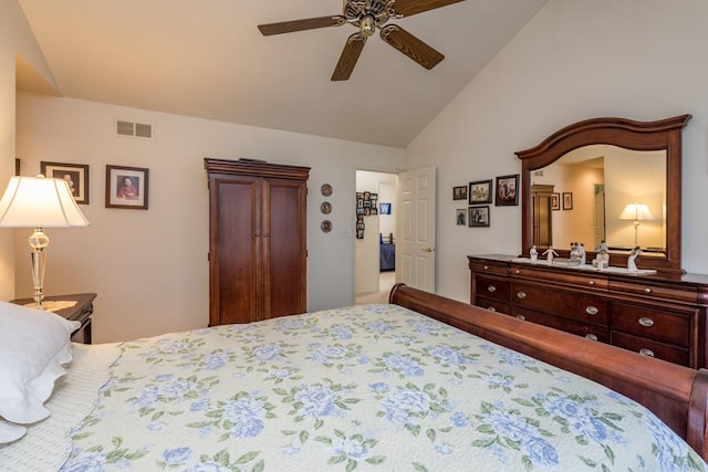 bedroom featuring ceiling fan and lofted ceiling