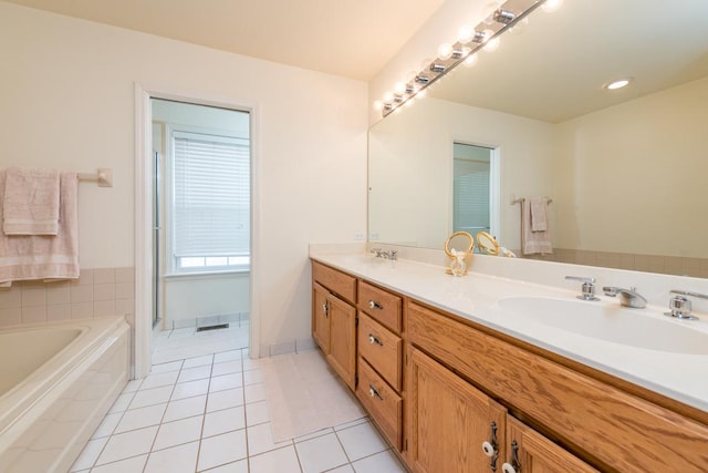 bathroom featuring tile patterned floors and vanity