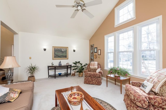 living room featuring ceiling fan, carpet, and high vaulted ceiling