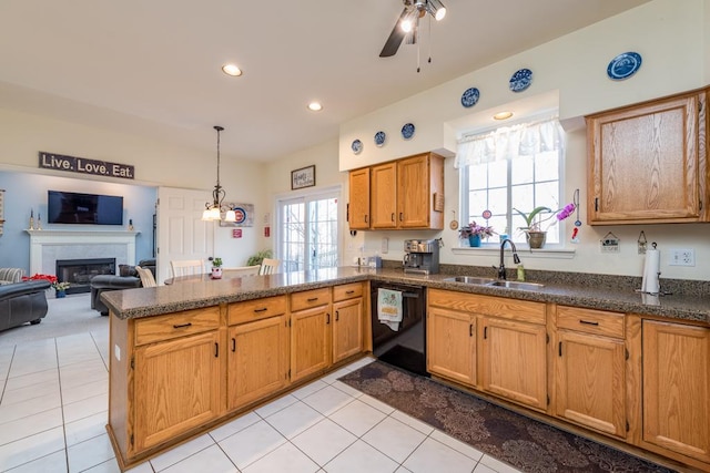 kitchen featuring sink, dishwasher, kitchen peninsula, and light tile patterned flooring