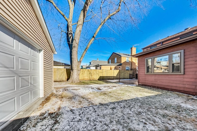 view of yard with a garage