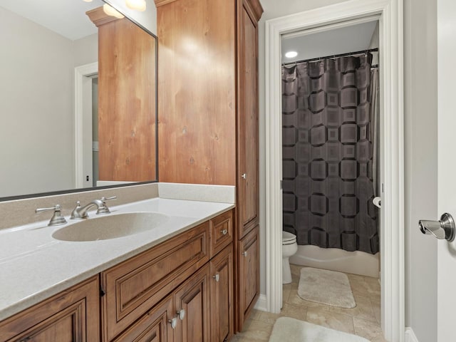 full bathroom featuring shower / bath combination with curtain, vanity, and toilet