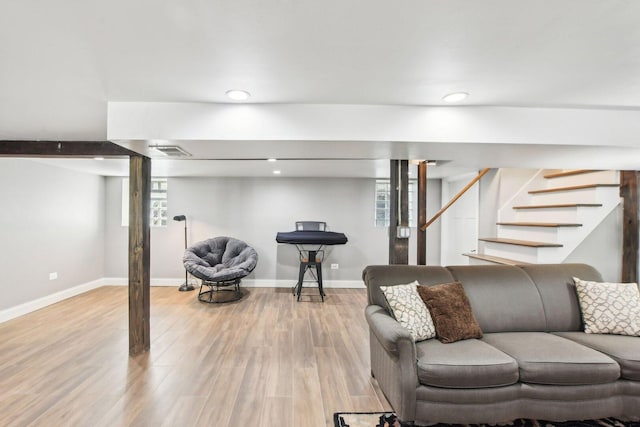 living room featuring stairs, wood finished floors, baseboards, visible vents, and recessed lighting