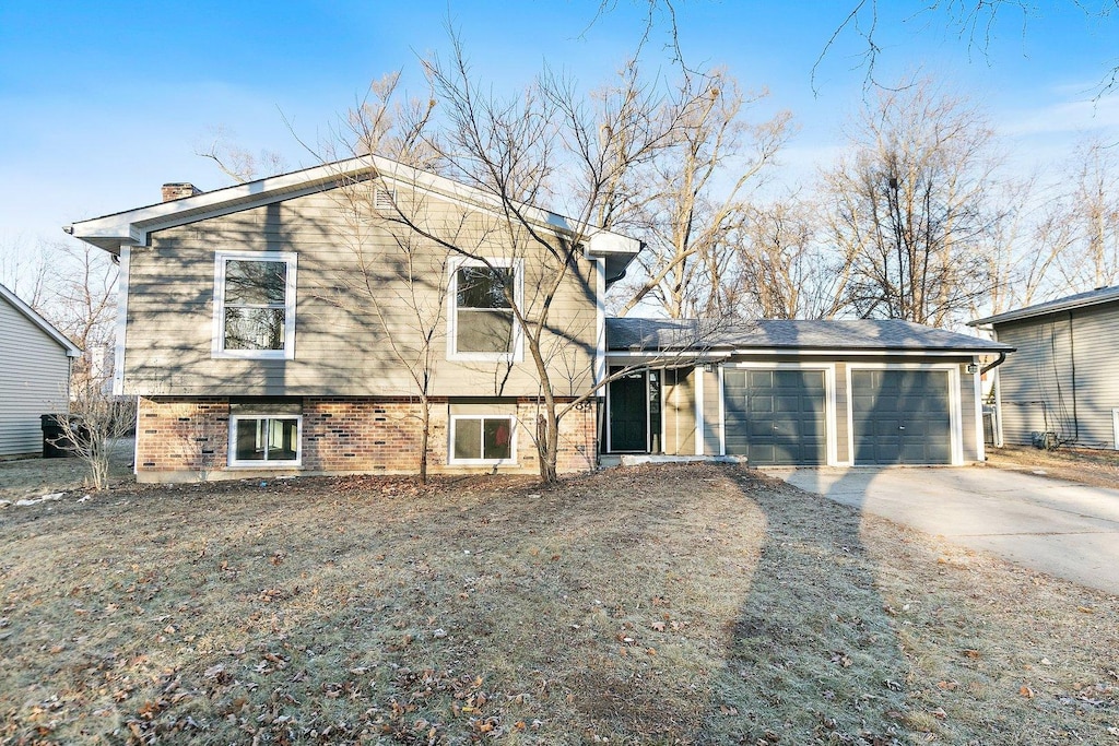 split level home featuring a garage