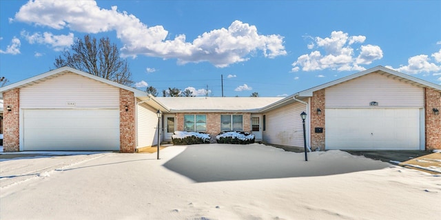 single story home featuring a garage