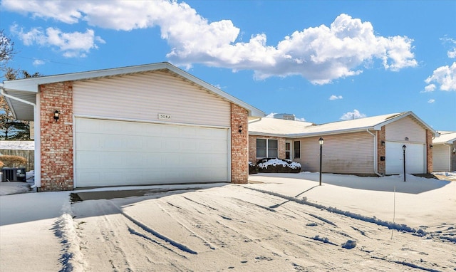 ranch-style home with a garage