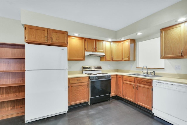 kitchen featuring white appliances and sink