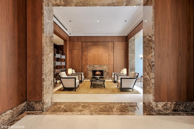 sitting room with wood walls