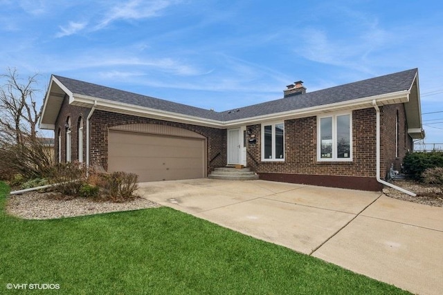 ranch-style home with a front lawn and a garage