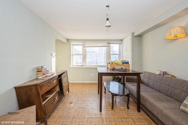 home office featuring light parquet floors