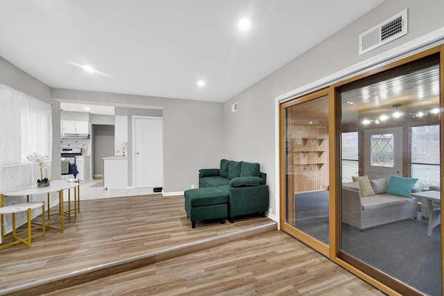 living area featuring light hardwood / wood-style floors