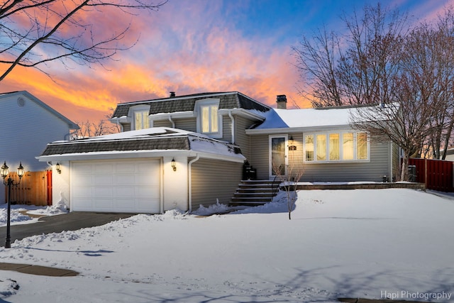 view of front of property featuring a garage