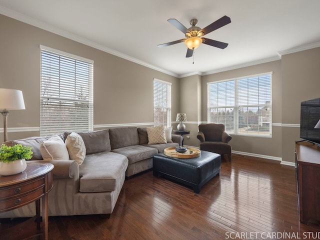 living area with dark wood-style floors, baseboards, crown molding, and a ceiling fan