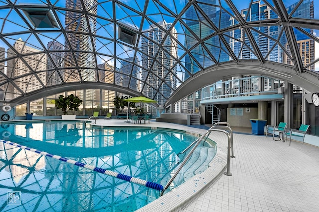 view of swimming pool with a patio area