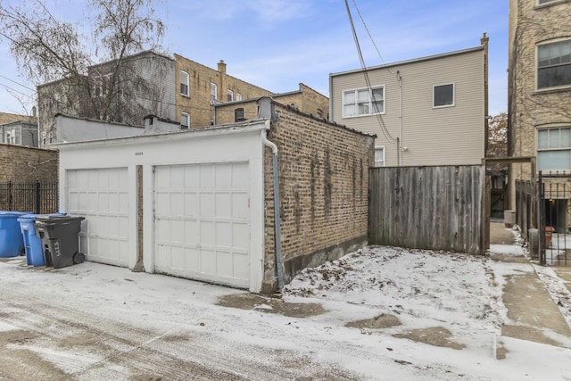 view of snow covered garage